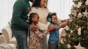 Father, mother and children at Christmas